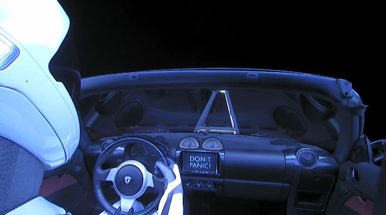 Dont Panic - Tesla Roadster lecący w kosmos
